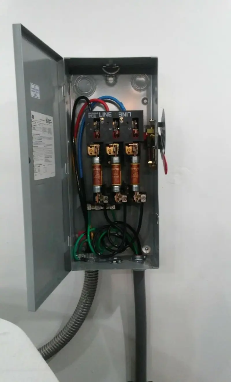 Three-phase disconnect switch installed for Smoke Detector Installation in Riverhead