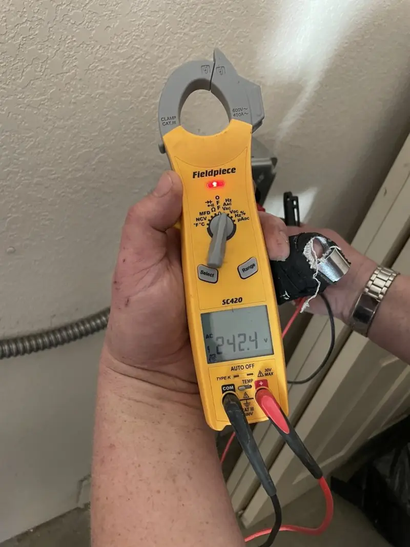 Voltage testing with clamp meter during Generator Installation in Riverhead